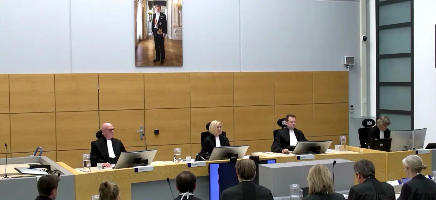The three judges on the bench at the 22 October 2026 hearing in Leeuwarden